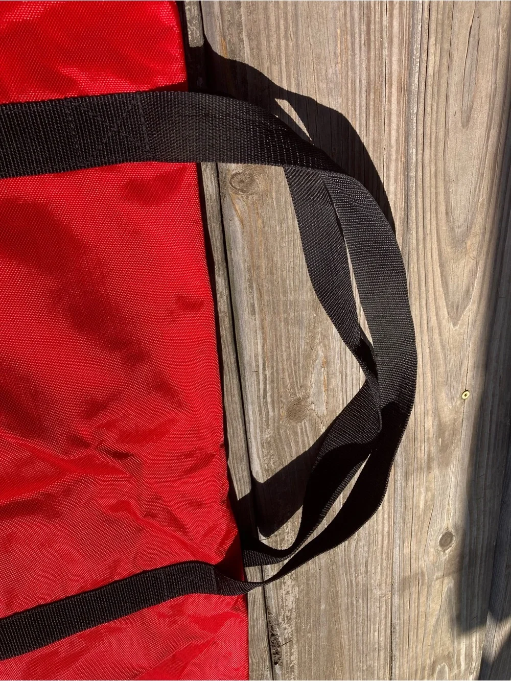 Marlboro Red Duffel with Black Web Handles and Adventure Team Logo